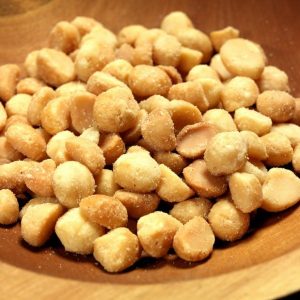 Salted Macadamia Nuts in a Wooden Bowl Food Picture
