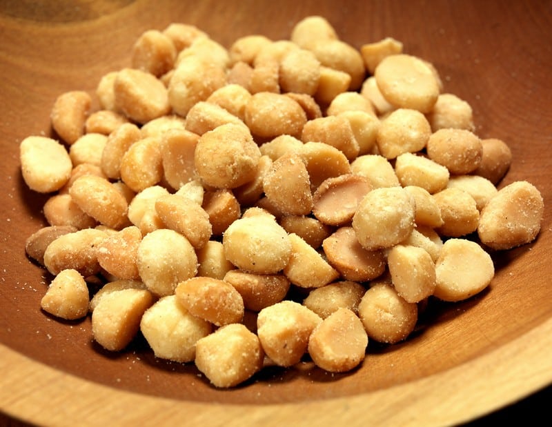 Salted Macadamia Nuts in a Wooden Bowl Food Picture