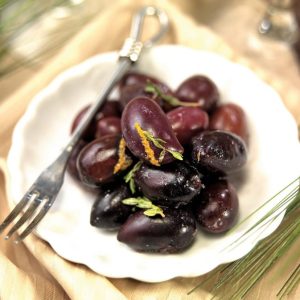 Marinated Olives on a Dish with a Fork Food Picture