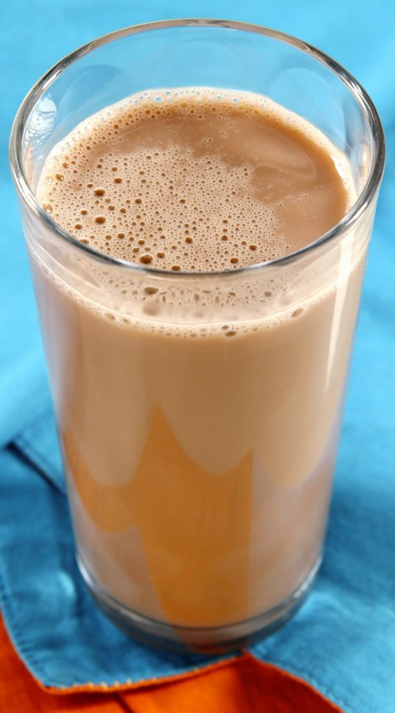 Glass of Chocolate Milk on Table Food Picture