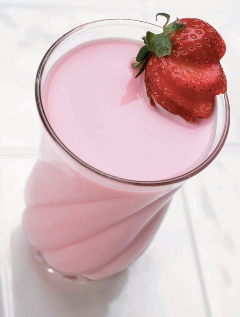 Strawberry Milk in Clear Glass on Tile with Strawberries Food Picture