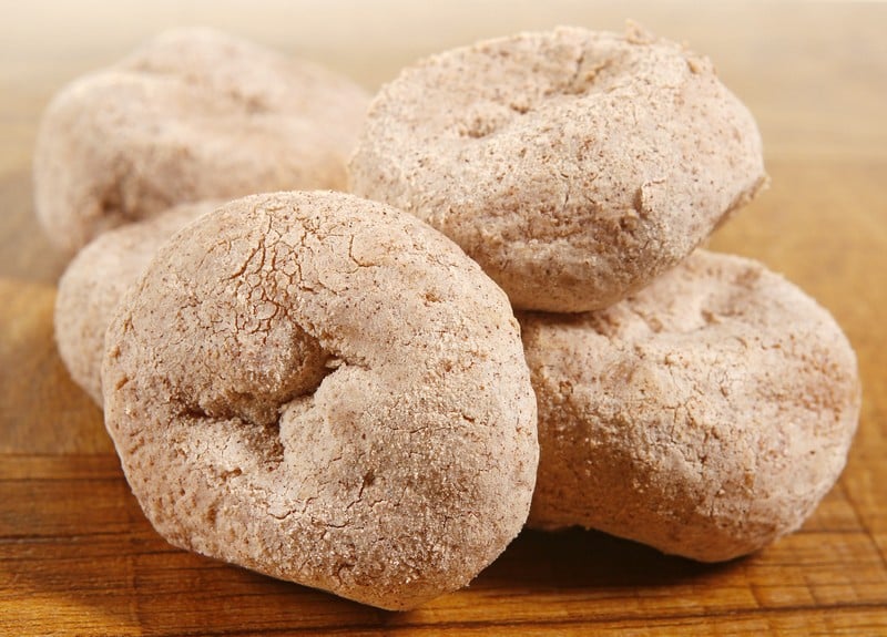 Cinnamon Sugar Powdered Homestyle Donuts on Hardwood Tabletop Food Picture