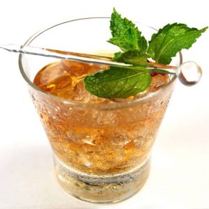 Mint Julep Cocktail on the Rocks in a Highball Glass with a Sprig of Mint Food Picture