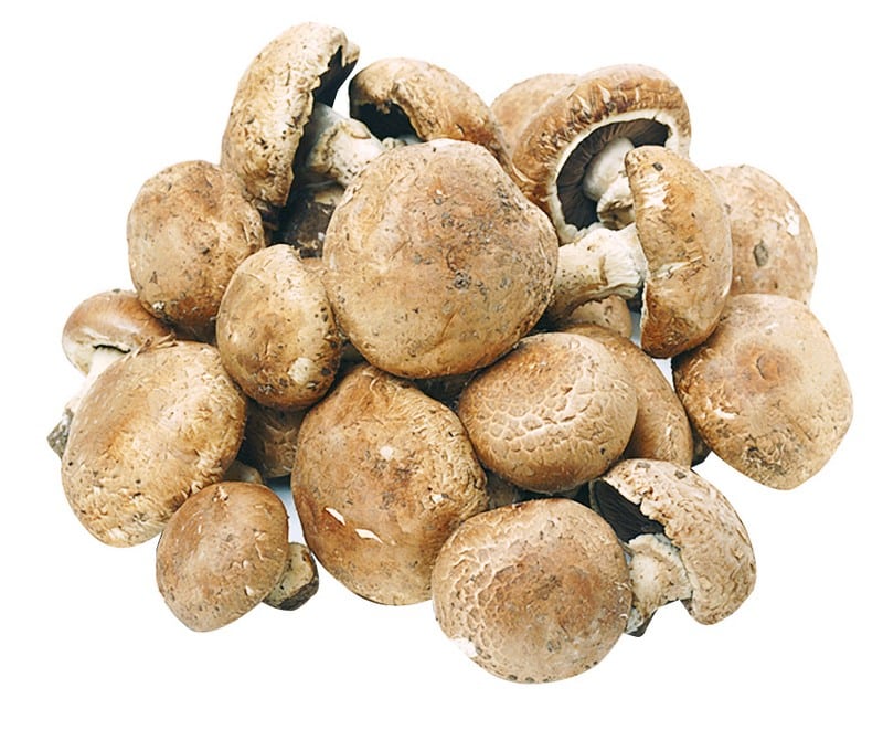 Whole crimini mushrooms on a white background Food Picture