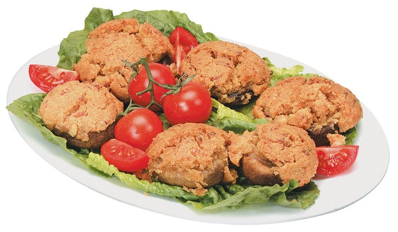 Stuffed Mushrooms with lettuce and tomato on white plate Food Picture