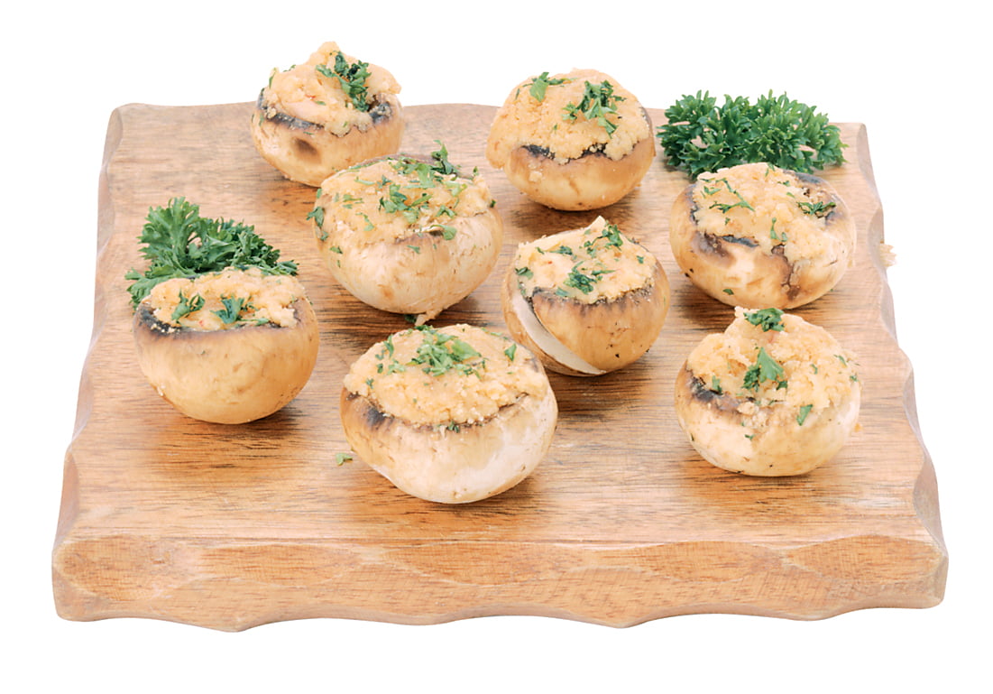 Stuffed mushrooms with garnish on wooden serving tray Food Picture