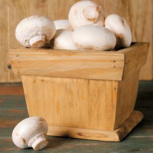 White mushrooms in a wooden box with a wooden background Food Picture