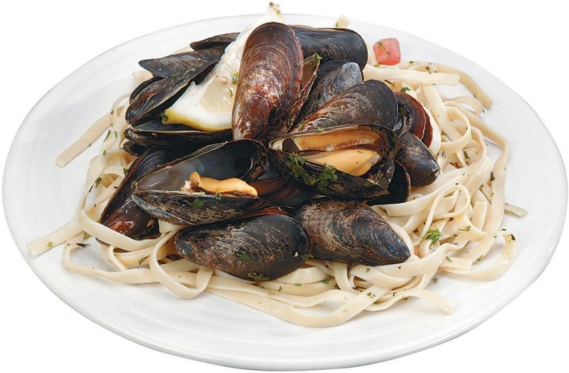 Cooked Mussels with Lemon and Noodels on a Plate Food Picture