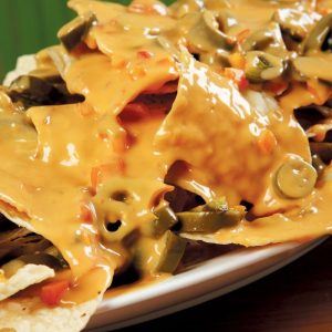 Nachos with Cheese on Wooden Surface Food Picture