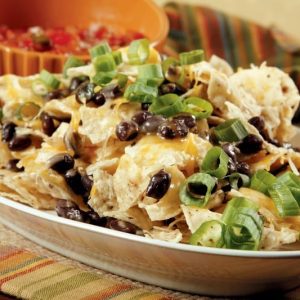 Nachos with Scallions and Olives in White Dish Food Picture
