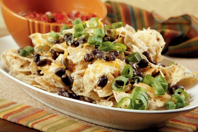 Nachos with Scallions and Olives in White Dish Food Picture