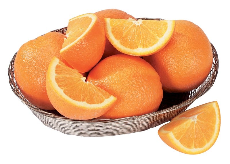 Fresh Whole and Wedged Oranges in Basket Food Picture