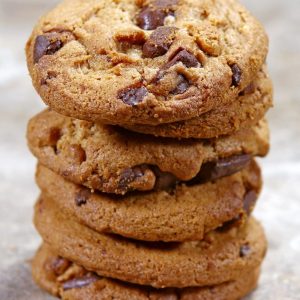 Stack of Bakery Fresh Chocolate Chip Cookies on Stone Countertop Food Picture