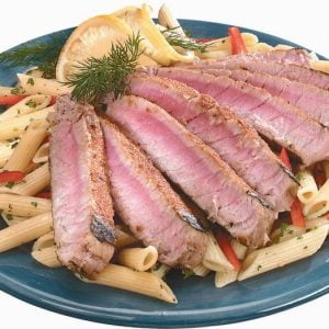 Penne Pasta with Sliced Tuna on a Plate Food Picture