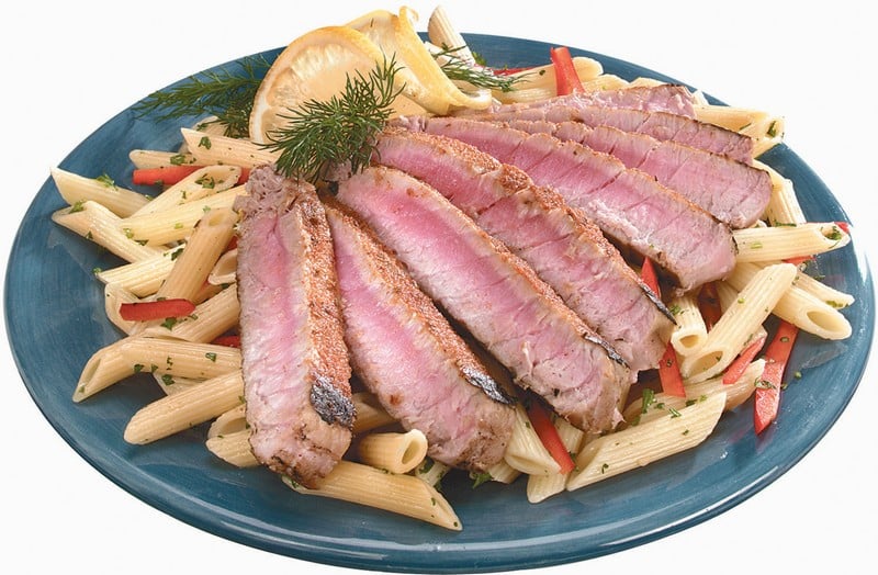 Penne Pasta with Sliced Tuna on a Plate Food Picture