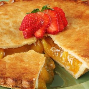 Peach Pie with Strawberries on Top Food Picture