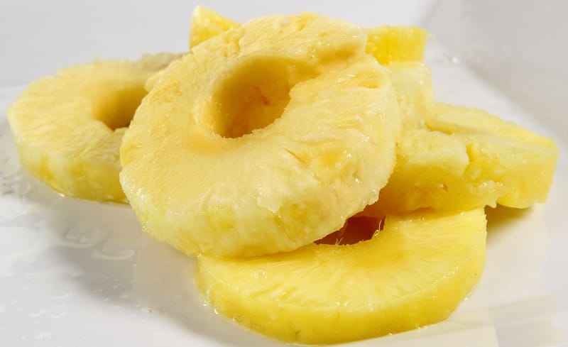 Freshly Sliced Juicy Pineapple Rings in White Ceramic Bowl Food Picture