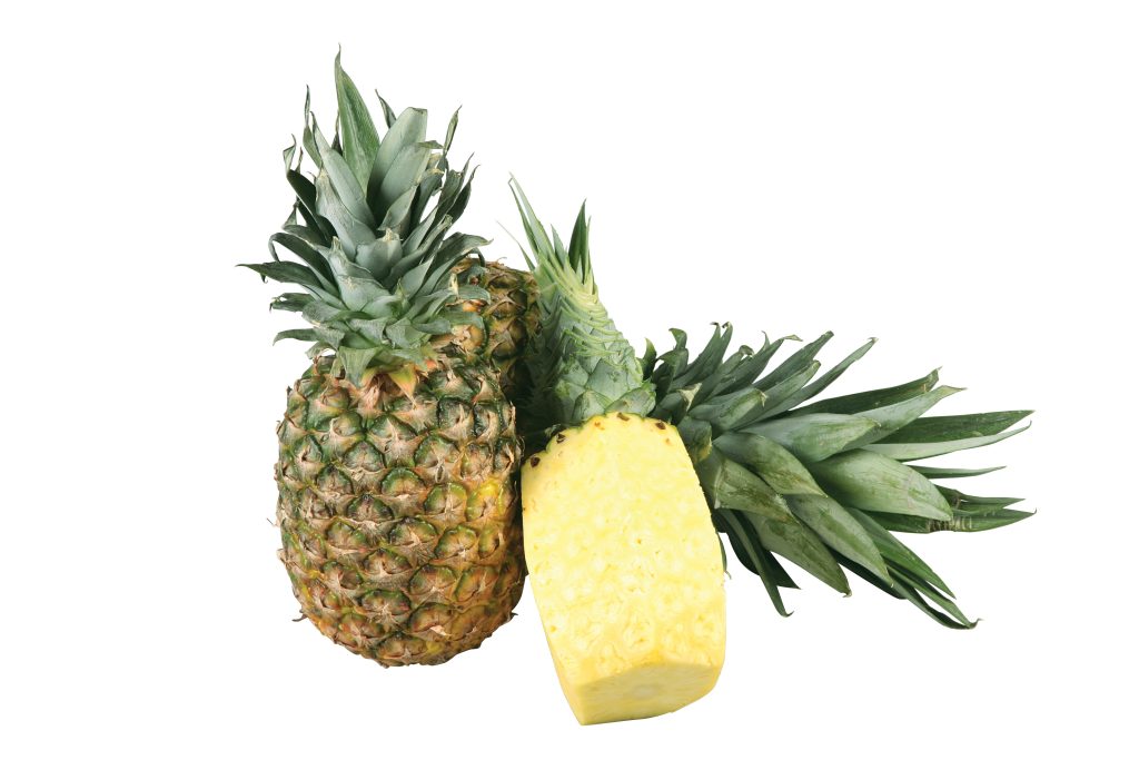 Two Pineapples and is Cut Food Picture