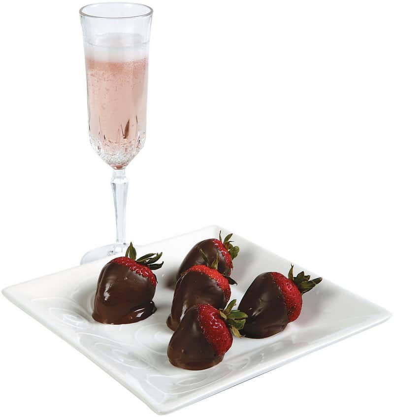 Pink Champagne with Chocolate Strawberries on a Plate Food Picture