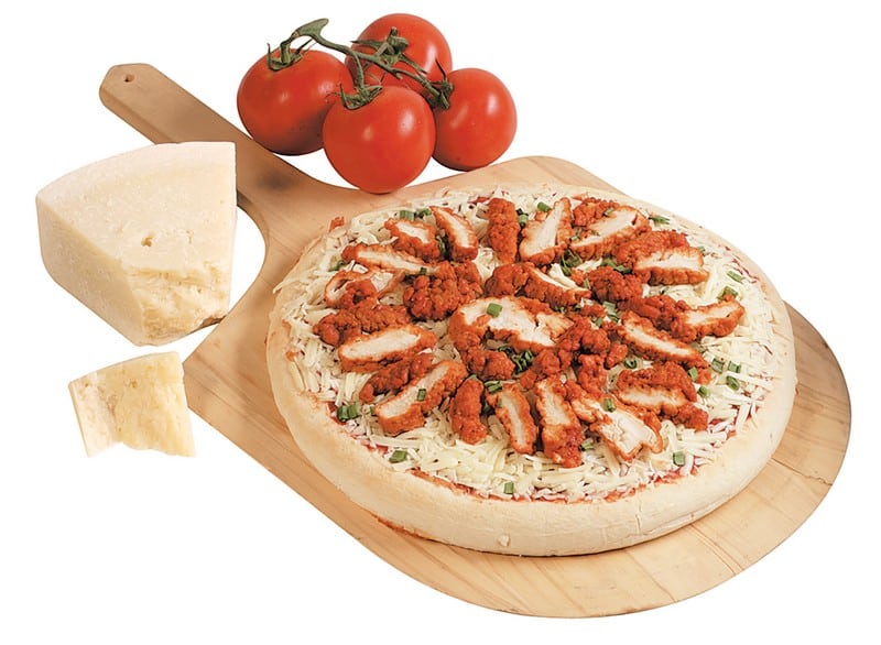 Buffalo Chicken Pizza on Wooden Pizza Board with Cheese and Tomatoes on the Side Food Picture