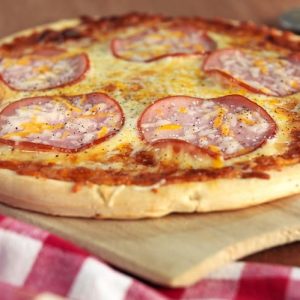 Whole Uncut Canadian Bacon Topped Pizza Food Picture