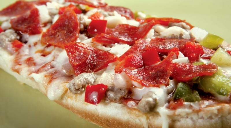 French Bread Pizza on Green Background Food Picture