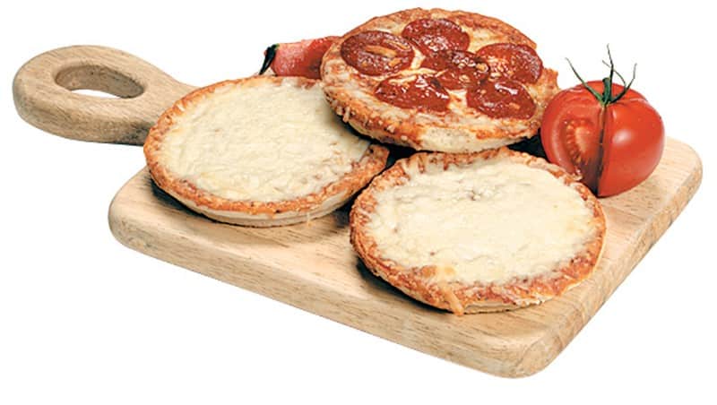 Personal Pizza Assortment with Tomato Garnish on Wooden Board Food Picture