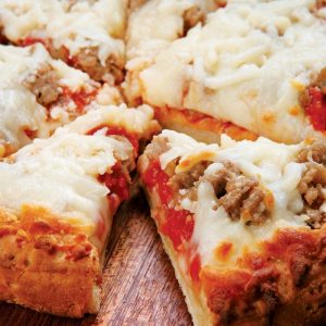 Mini Sausage and Cheese Pizza on Wooden Surface Food Picture