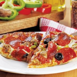 Sliced Pizza with Toppings on White Plate Food Picture