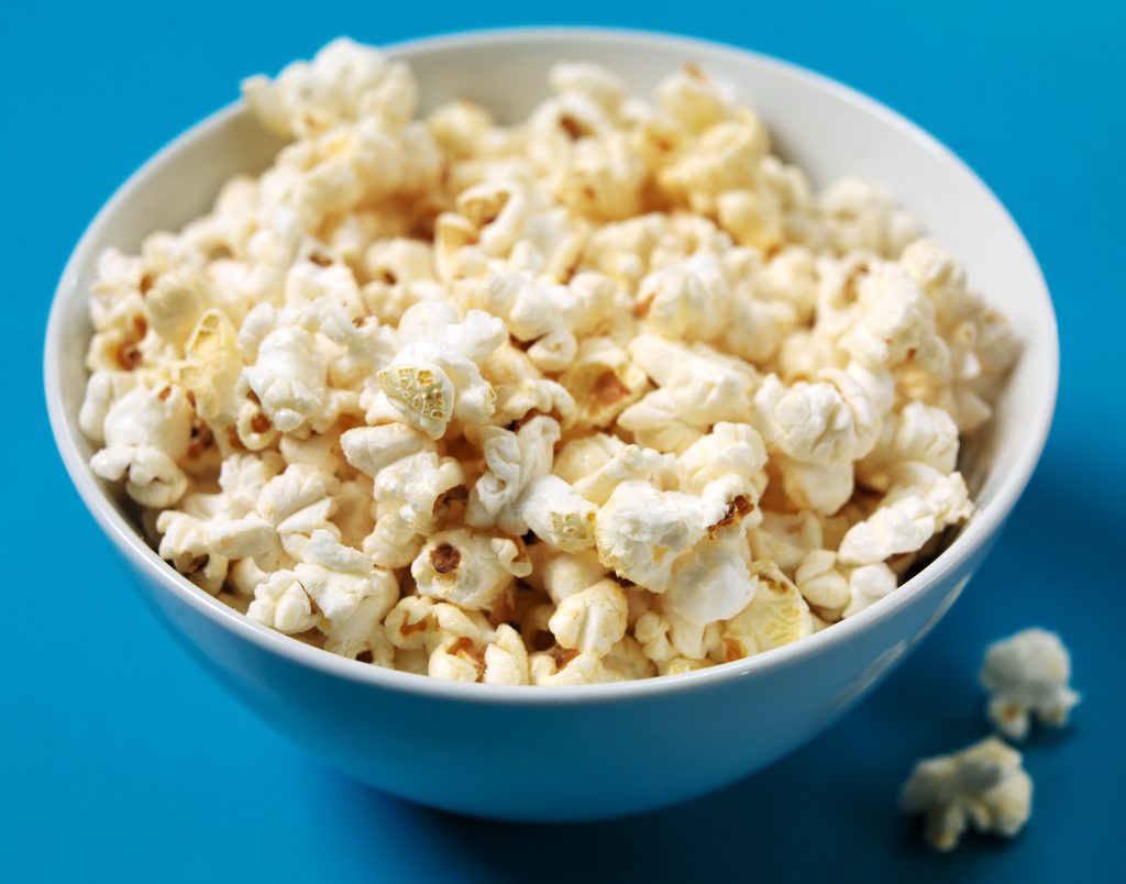 Fresh Popped Popcorn in Blue Bowl Food Picture