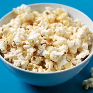 Fresh Popped Popcorn in Blue Bowl Food Picture
