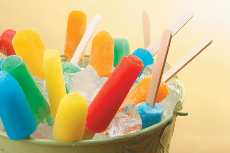 Assorted Mini Popsicles in Green Dish with Ice Food Picture