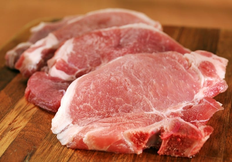 Raw Center Cut Pork Chops on Cutting Board Food Picture