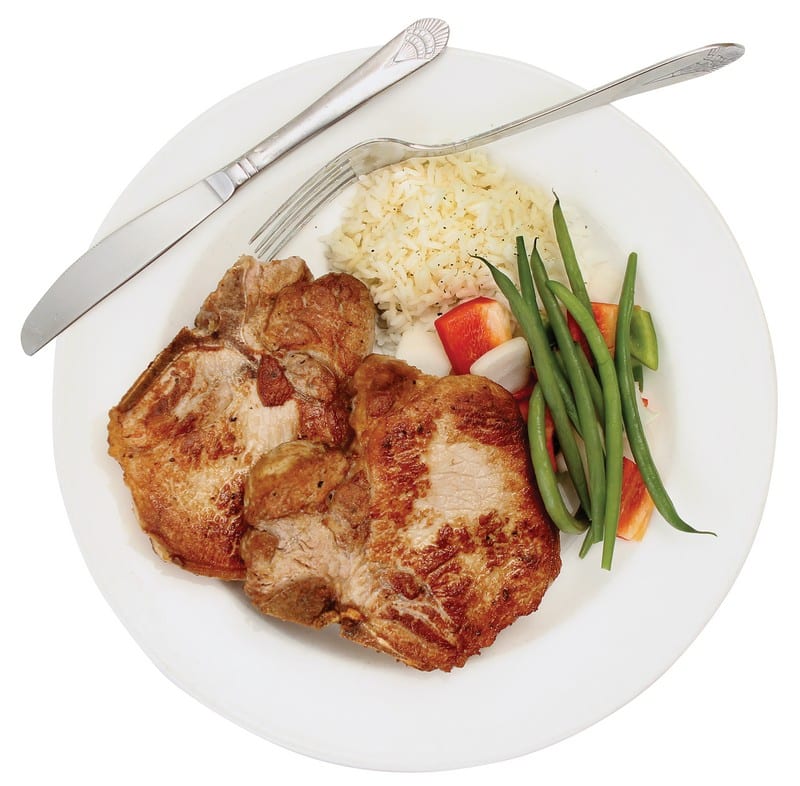 Pork Chops on a Plate with Rice and Veggies Food Picture