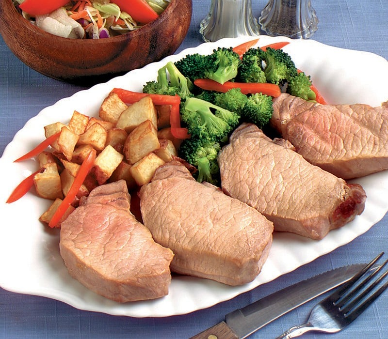 Pork Chops on a Plate with Broccoli and Potatoes Food Picture
