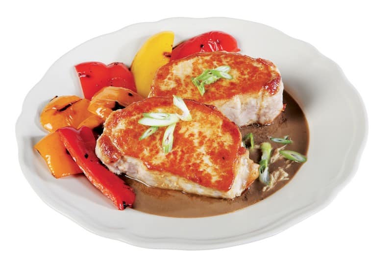 Pork Chops on a Plate with Sauce Food Picture