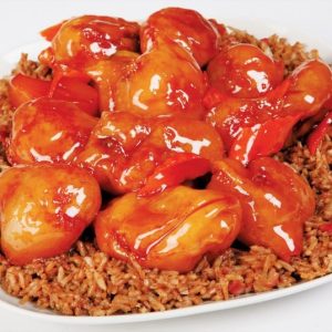 Sweet and Sour Pork over Fried Rice in White Dish Food Picture