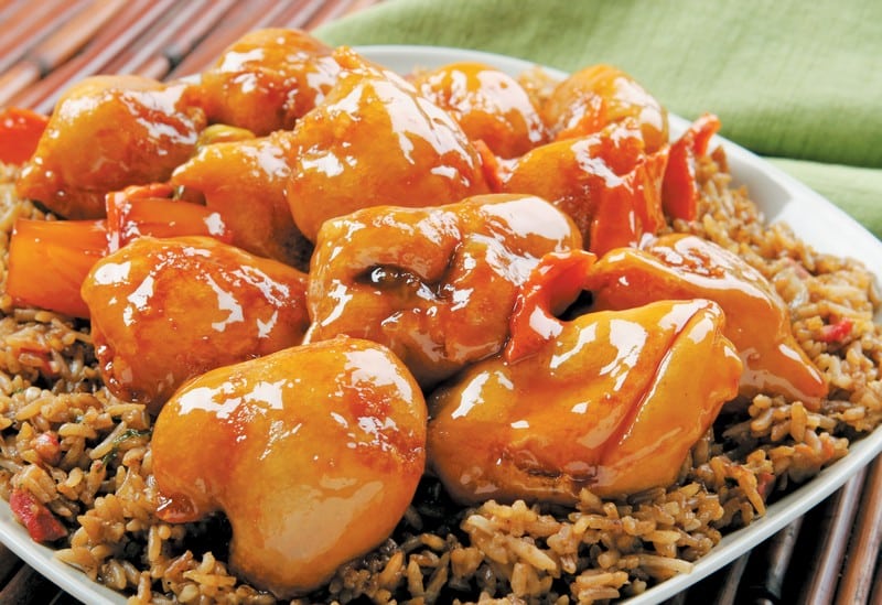 Sweet and Sour Pork over Rice in White Dish Food Picture