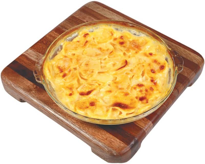 Au Gratin Potatoes on Board Isolated Food Picture
