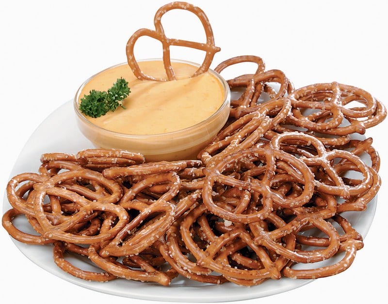 Pretzels on a Plate with Cheese Dip Food Picture