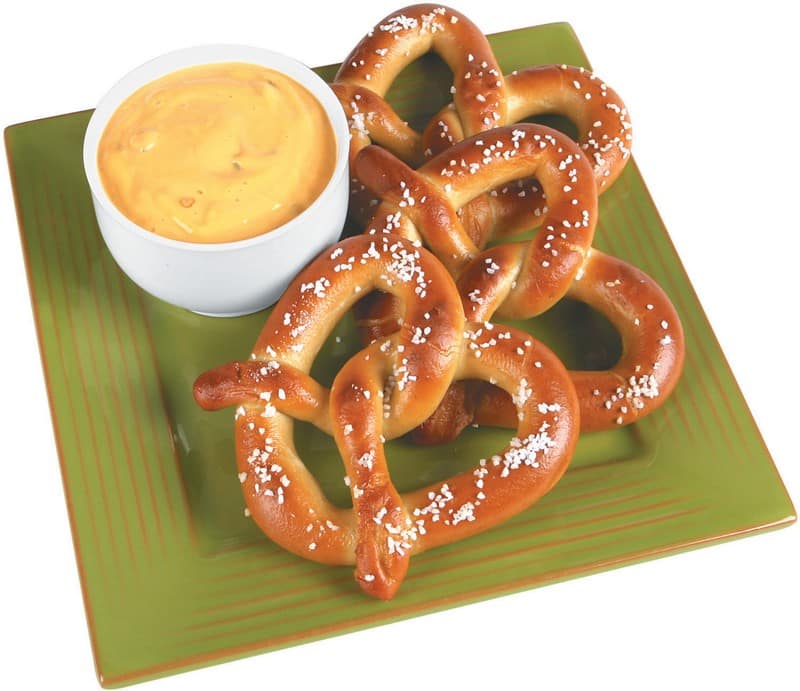 Pretzels on a Plate with Cheese Sauce Food Picture