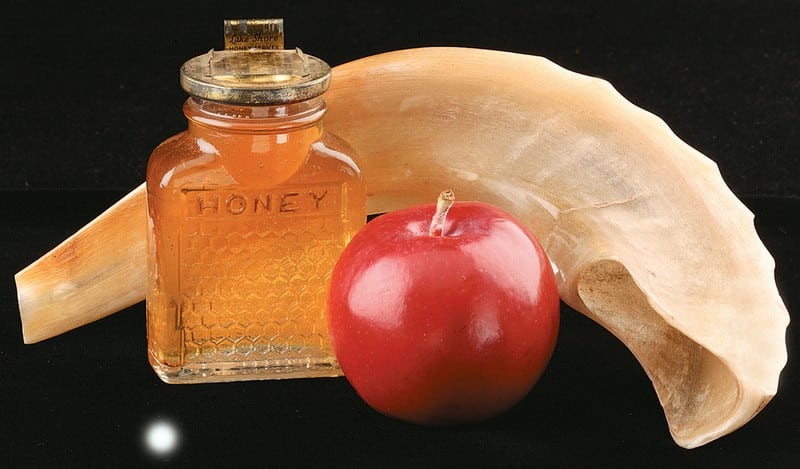Purim with Honey and an Apple on Black Background Food Picture