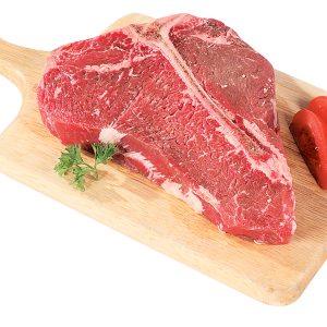 Raw Beef Porterhouse on a Wooden Board with Tomatoes Food Picture