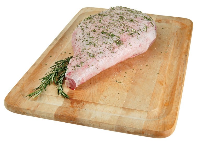 Raw Lamb Leg on a Wooden Board Food Picture