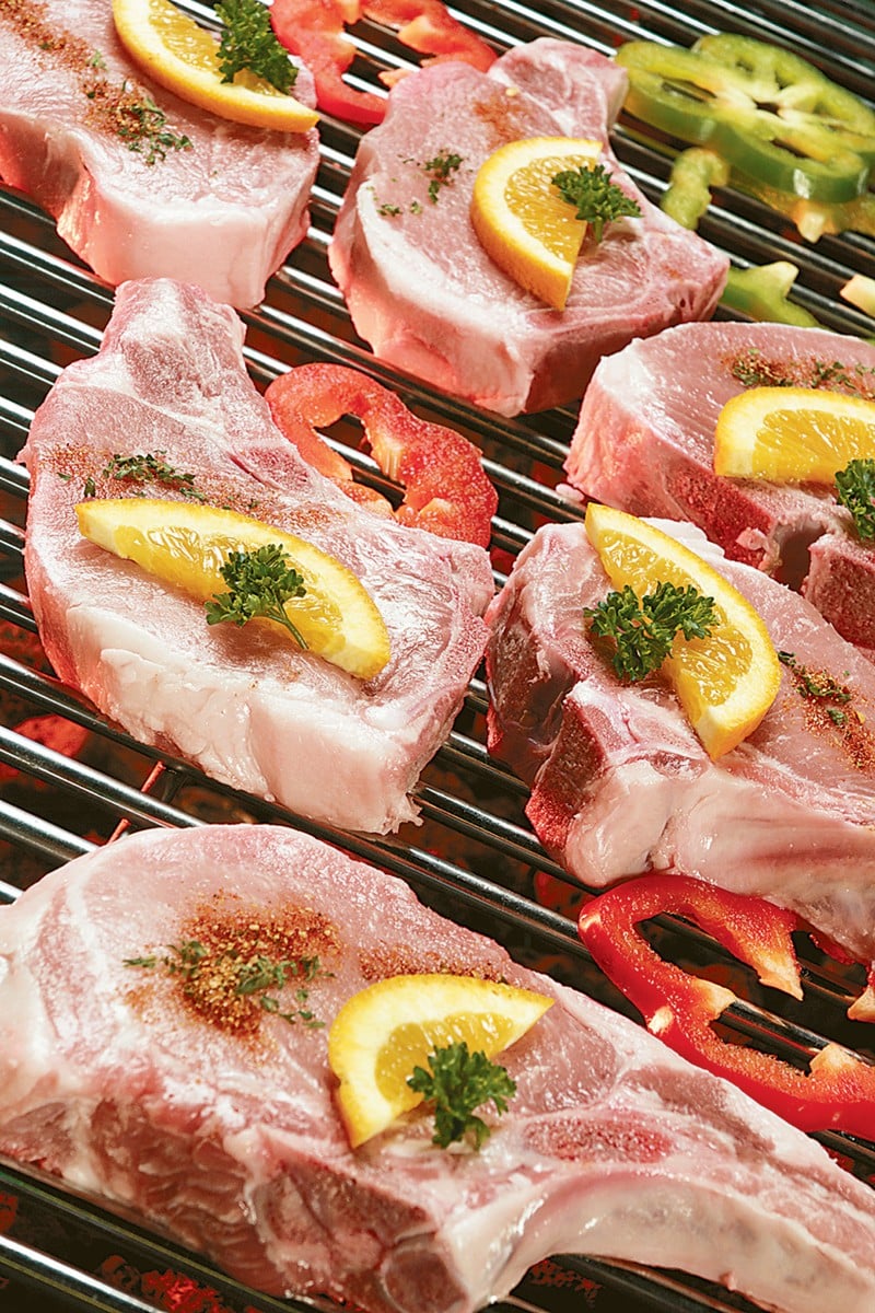 Raw Bone-In Pork Chops on Grill Food Picture