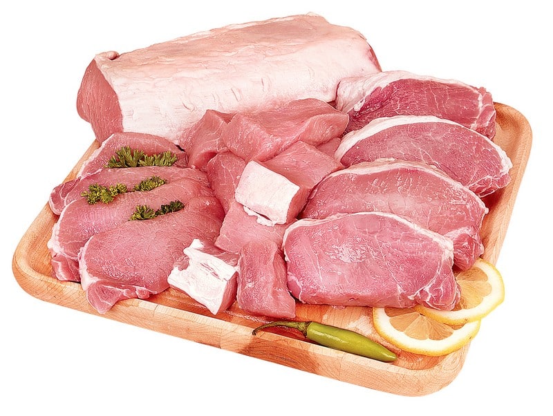 Assorted Boneless Pork Chops on Cutting Board Food Picture
