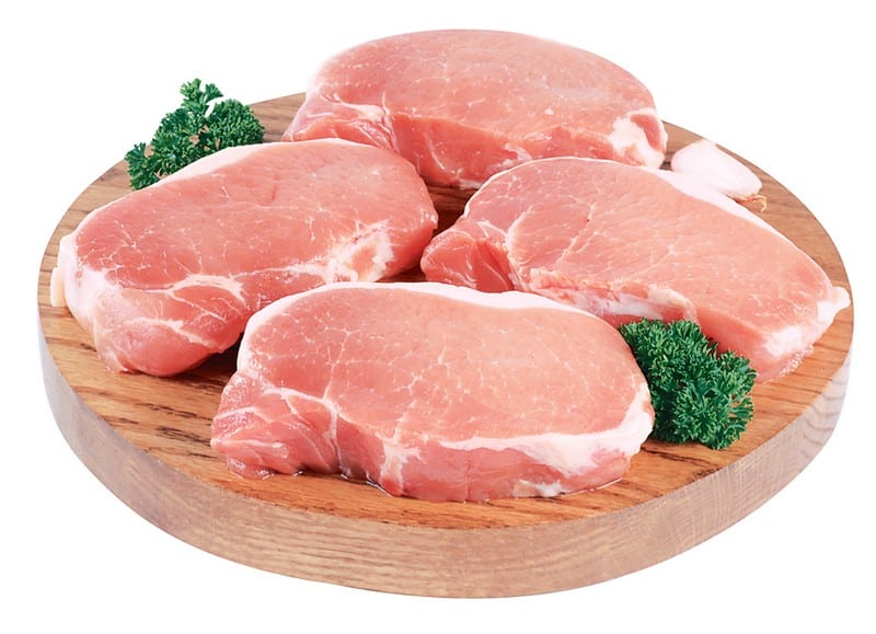 Fresh Raw Boneless Center Cut Pork Chops on Cutting Board Food Picture