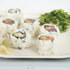 Raw Sushi with Ginger and Side Salad on White Plate Food Picture