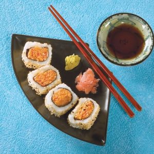 Raw Sushi on Black Plate and Blue Background Food Picture