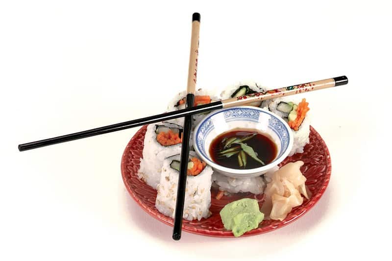 Raw Sushi California Roll on Red Plate with Chopsticks Food Picture